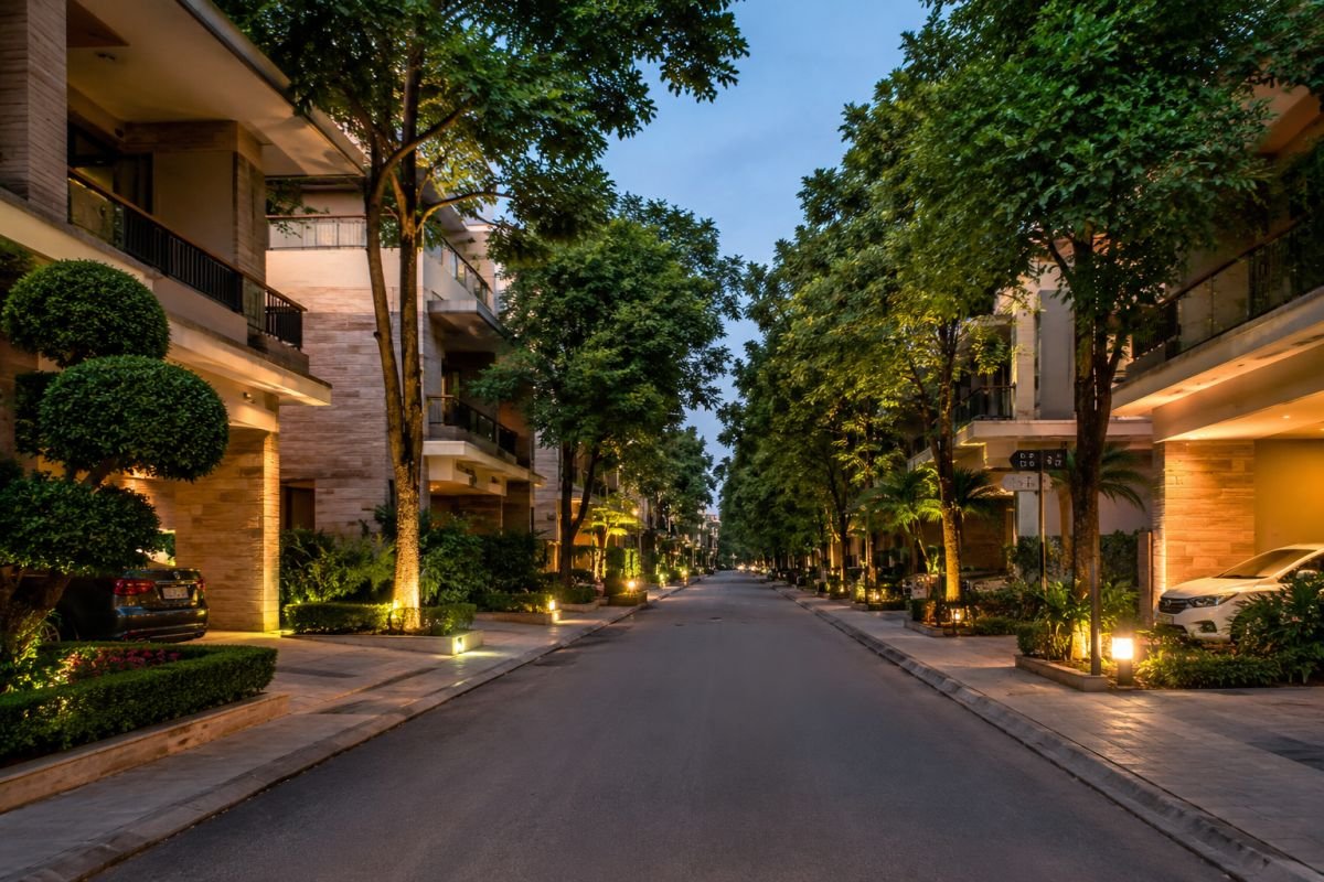 Tree-lined internal roads inside low-density luxury community in Sector 65 Gurgaon