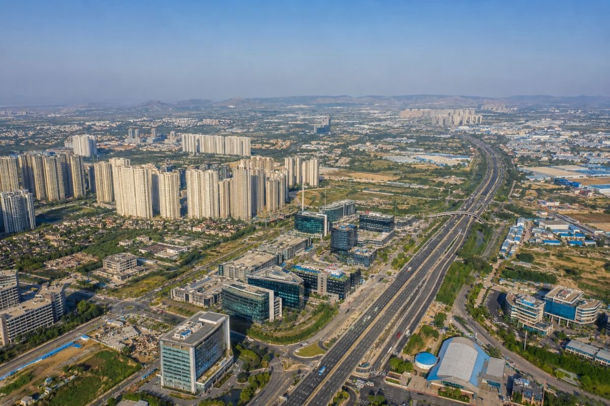 Aerial view of the Gurgaon Manesar Sohna Corridor showing highways, residential developments and commercial growth zones